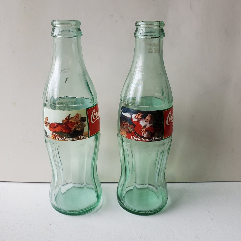 2 for $25 Coca-Cola Vintage Empty Bottle Christmas 1996, 8 oz each.